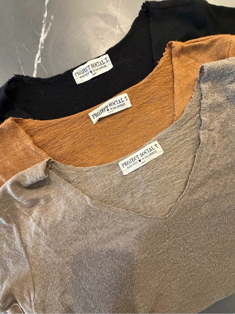 THREE Project Social T OG’s